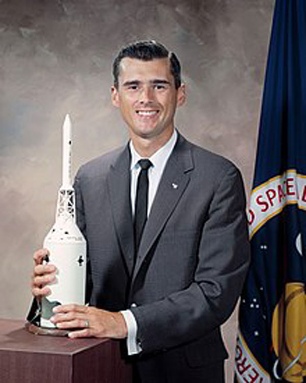 Roger B. Chaffee holding model rocket